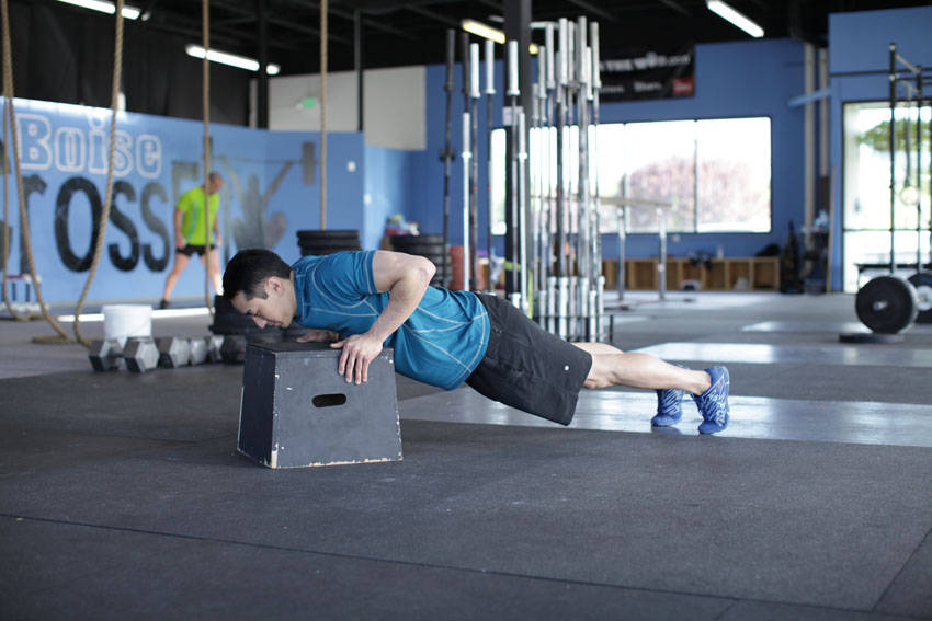 Flexiones con manos elevadas — ejecución del ejercicio