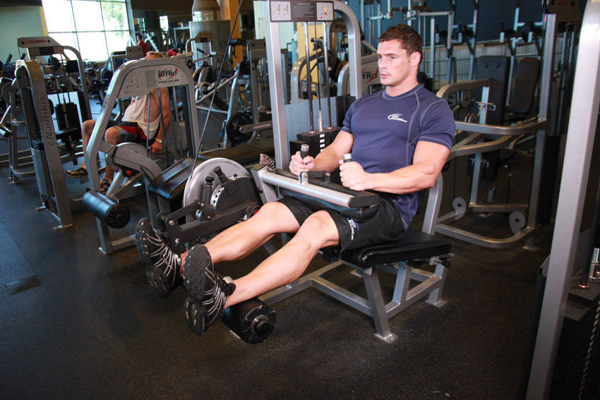 Curl femoral sentado — ejecución del ejercicio